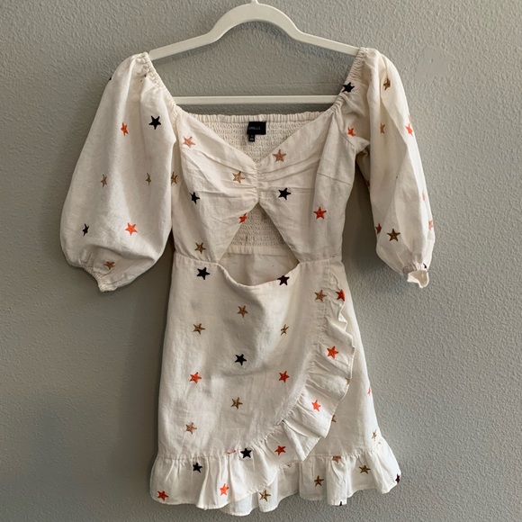 White dress with red & blue stars. Front cutout and side zipper. Fits like xs/s - Picture 3 of 7